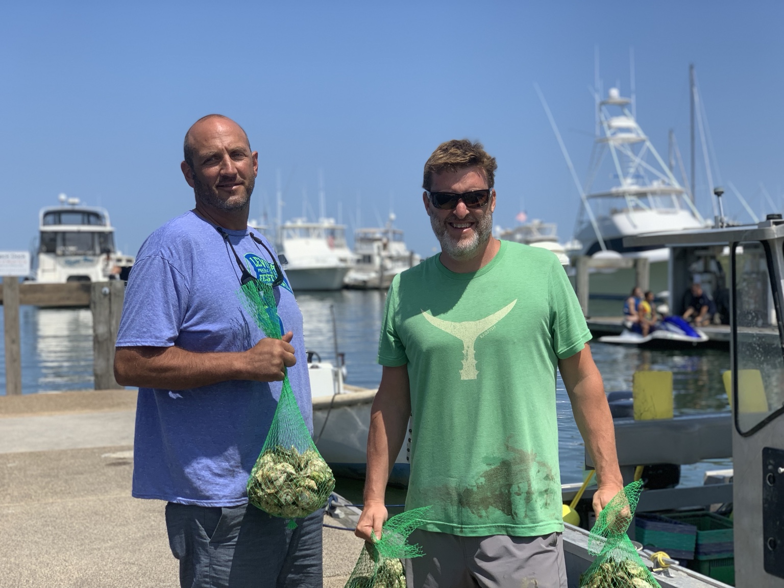 Plimoth 102s founders Ryan and Ethan at the harbor